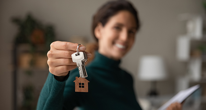 Woman holding house keys